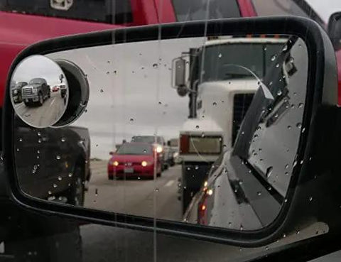 Blind Spot Mirror Set For Cars 2 Inch Round HD Glass Frameless Convex Rear View Mirrors Pack Of 2 Ampper visible in side view mirror with traffic.