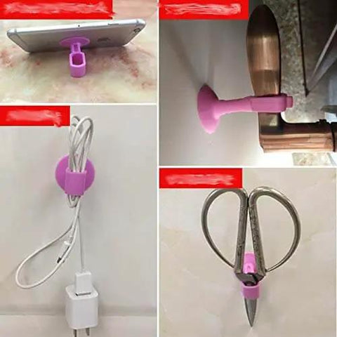 Multi-purpose silicone holders in purple, used for phone stand, door stopper, cord organizer, and scissors holder.