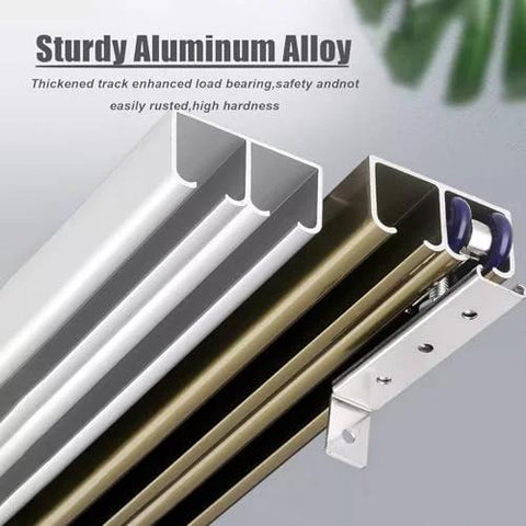 Close-up of Beefed Up Heavy Duty Aluminum Sliding Barn Door Hardware Kit with double bypass aluminum tracks and rollers.