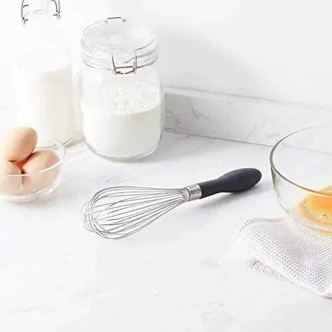 Stainless Steel Balloon Whisk Set 3 Piece With 9 Inch 10 Inch And 11.5 Inch Sizes Easy Grip Ergonomic Handle in a kitchen setting