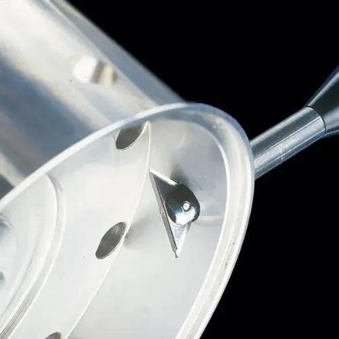 Close-up of RC2200 Large Reversible Deburring Tool Holder Set with R3 Blade showing deburring function on metal surface
