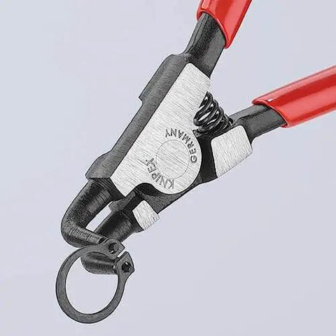 Close-up of external 90 degree angled snap ring pliers with forged tips, precision grade tool, durable construction, ergonomic grip for tradesmen use