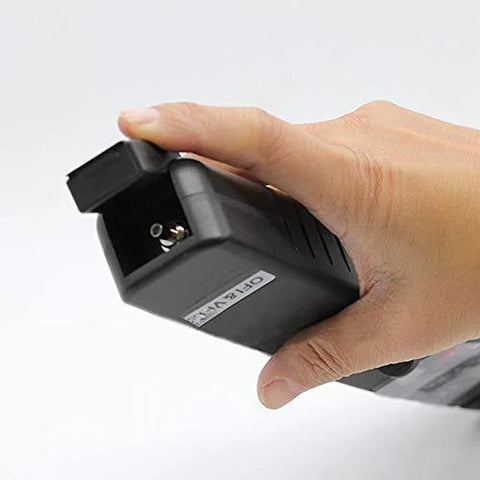 Black handheld D YEDEMC live optical fiber identifier with built-in VFL, held in hand.