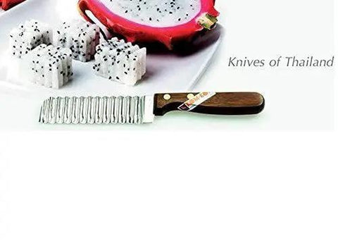 Crinkle Cutter Knife With Wood Handle For Vegetables And Fruits Carving And Food Decoration Ideal For Special Dinners Creative Plating And Kitchen Prep Stainless Steel Blade For Easy Slicing And Fun Texture with exotic fruit pieces on a plate.
