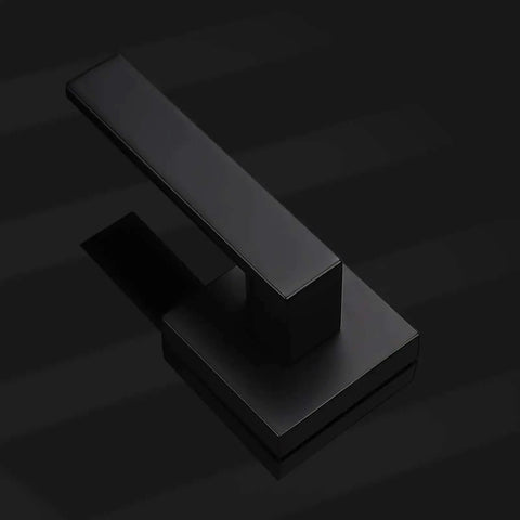 Matte Black Dummy Door Levers Interior Handles For Closets And Pantry Doors, single handle close-up on black surface
