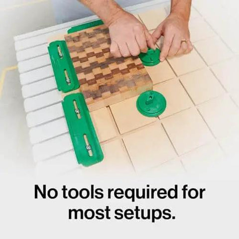 Person using the MatchFit CNC Clamping Kit For Woodworking And Milling, 11 Piece Green Set with Edge and U Pad Clamps.