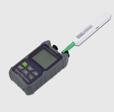 Enajucy fiber optic cleaner pen for LC/MU and SC/FC connectors, attached to a gray handheld optical tester with green connector.