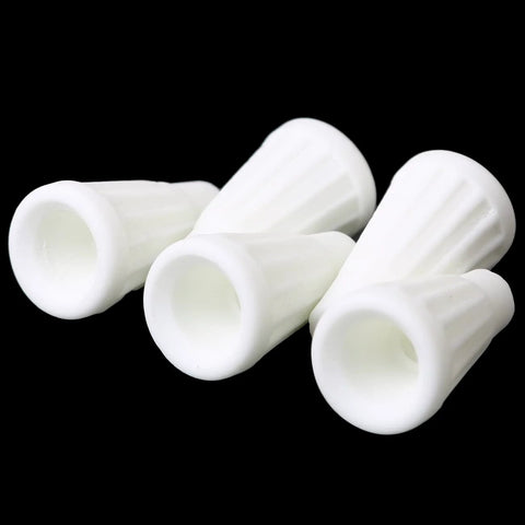 White porcelain ceramic wire connectors, small 4-piece set for high-temperature electrical repairs.