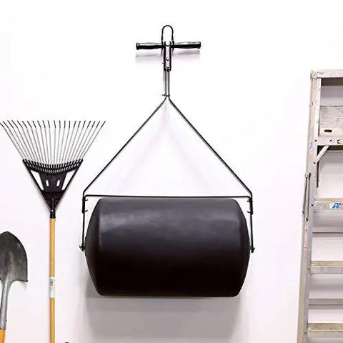 Powerful 270 Lb Poly Lawn Roller For Push Or Tow With Easy Turn Tethered Plug And Quick Filling Drum 18 By 24 Inches hanging in garage