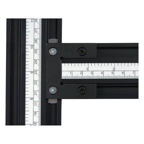 Adjustable Router Jig Frame and Guide System for Cutting Square and Rectangular Recesses, Slots, and Face Panel Molds With a Router, Large 23.6 By 23.6 Inches Working Area, Four 27.6 Inch Extrusion Rails With Dual Metric Imperial Scales Varijig showing close view of extrusion rails with scales.