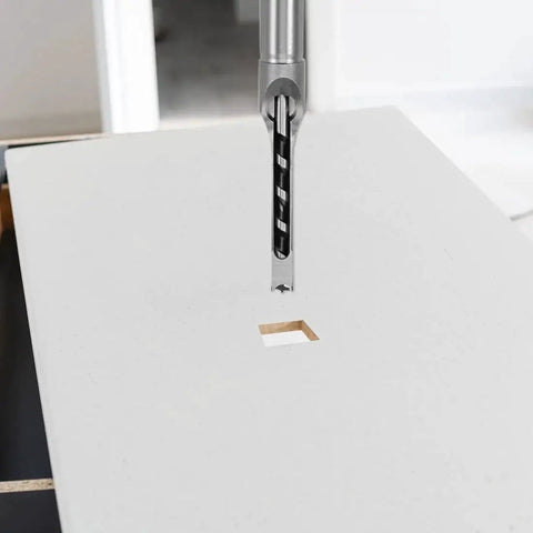 Square Hole Drill Bit For Woodworking One Half Inch Slotting Flute Diameter 75mm Cutting Depth 205mm Total Length Hollow Chisel Mortise Bit Two Pack High Carbon Steel For Power Tools in use making a square hole in wood