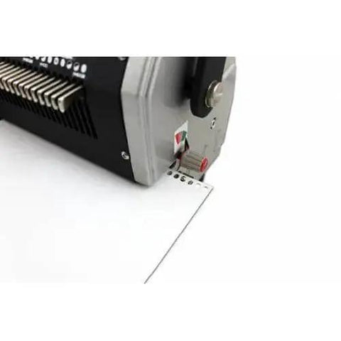 CoilMac-ER Plus Manual Coil Punch With Electric Inserter, 4x5mm Oval Holes, close-up of punching mechanism in use
