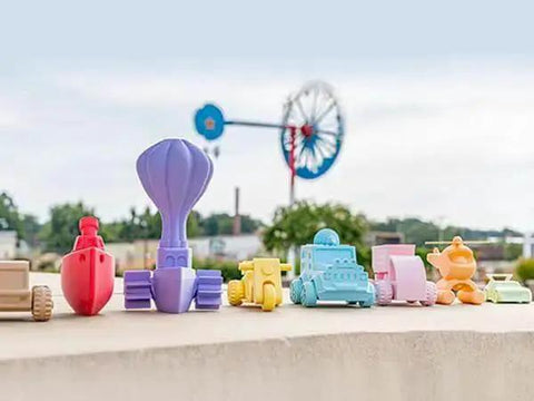 Collection of 3D printed toys using Panchroma Matte Pastel Periwinkle PLA Filament For 3D Printing, showcasing vibrant colors.
