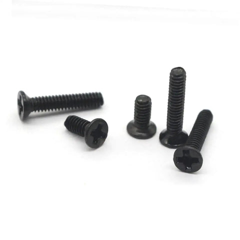 Close-up of black carbon steel screws from Miniature Countersunk Screw Set With Transparent Storage Case.