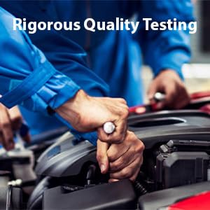 Mechanic performing quality testing on vehicle engine with tools visible