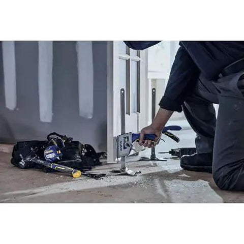Quick Lift Construction Jack With 10 Inch Lift And 330 Lb Capacity used to level a door during installation process