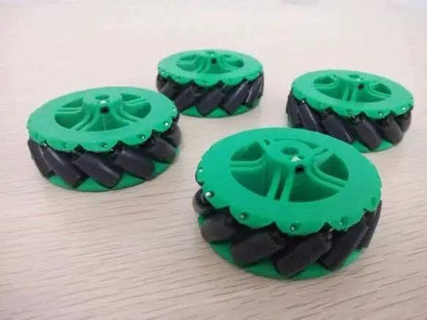 64mm Mecanum Omni Wheel for DIY Robots and 3D Printing Projects, green rubber rolling drive wheels with black rollers.