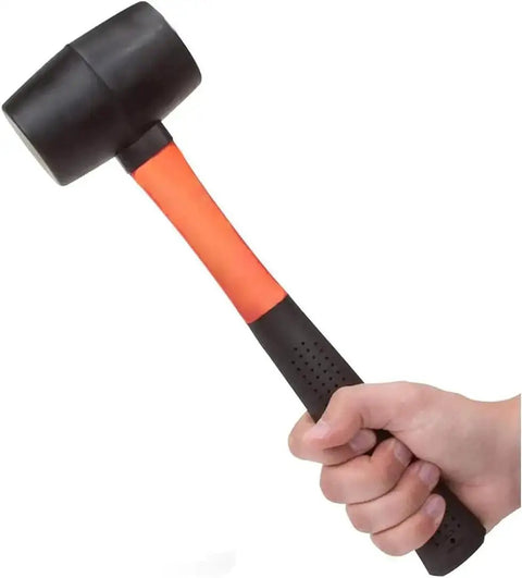 Hand holding 16 Oz Rubber Mallet Hammer With Fiberglass Handle And Shock Absorption Soft Blow Hammer For Flooring Tent Stakes Woodworking Camping And DIY Projects Ergonomic Non Slip Grip