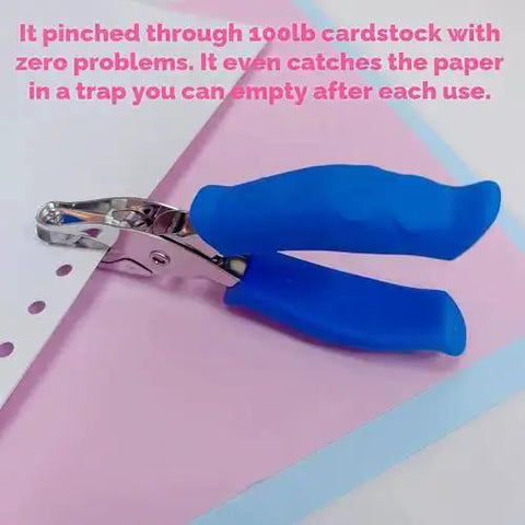 Blue One Circle Hole Punch With Soft Grip Handheld Paper Punch For Crafts Tags Card Making DIY Projects Scrapbooking And Greeting Cards Handy Small Puncher For Cardstock Laminated Cards shown on cardstock paper