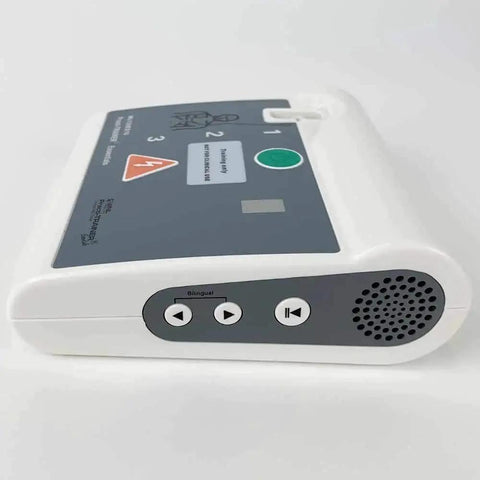 Side view of AED Defibrillator Practi Trainer Essentials Base Model Training Kit showing control buttons and speaker