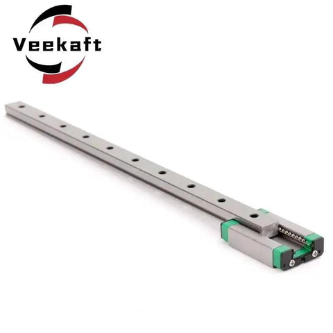 MGN Type Guide Rail Kit For Pro Grade Linear Motion With High Precision And Smooth Friction 100-600mm Adjustable Length For CNC And 3D Printers With One Rail And One Slider MGN15H 100mm, featuring a long metal rail and green slider block.