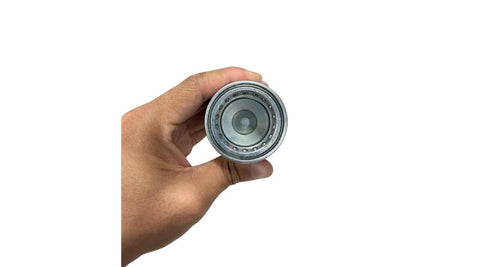Metal hydraulic quick-connect coupler, Pioneer style, ISO 5675, 1" NPT thread, front view held in hand