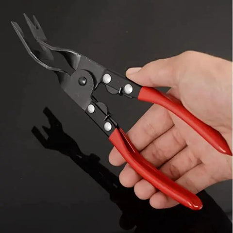 Heavy Duty Plastic Rivet Snap Pliers For Panel Clip Removal And Rivet Pulling with red and black handles held in hand