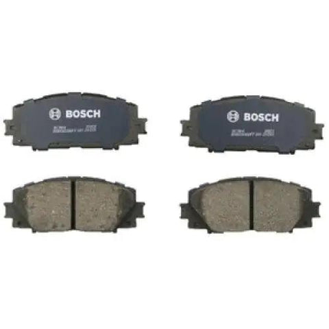 Bosch BC1184 QuietCast ceramic brake pad set for front, four pads with blue backing plates.