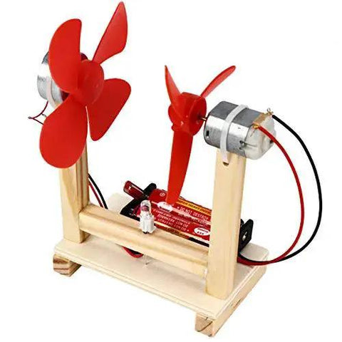 DIY project with Compact 130 DC Motor Set for Arduino Projects, red fan blades, battery pack, and wired setup on wooden frame.