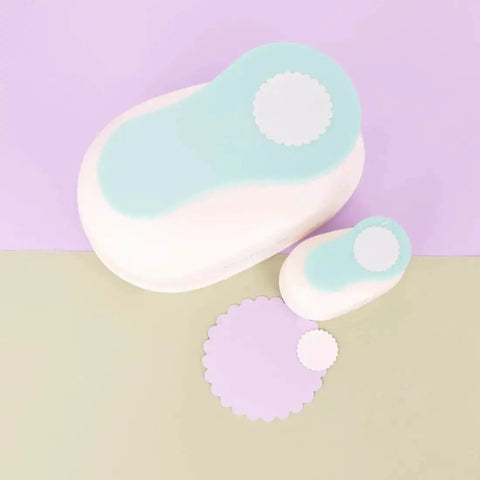 3 Inch Circle Scallop Punch with Easy Lever Press on pastel background, showing scallop cutouts for scrapbooking and paper crafts.