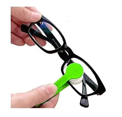 Person using Mini Microfiber Eyeglasses Cleaning Brush Clip For Dust Smudges On Glasses, green clip with microfiber pads.