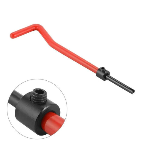 Close-up of a red handle threading tool from SAE Stainless 1/4-20 Inch Thread Repair Kit With Inserts And Tap For Auto Repair.
