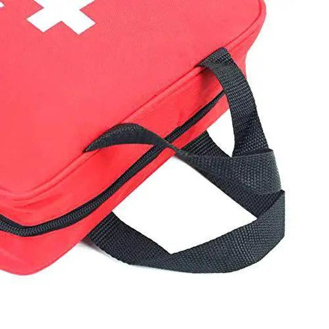 Compact Red First Aid Bag For Emergency Medical Supplies With An Organized Interior And Multiple Pockets Grab And Go, close-up of handle