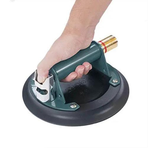 Hand holding 8 Inch Glass Vacuum Suction Cup With Metal Handle And Brass Pump, Built Tough Heavy Duty Vacuum Lifter For Granite And Glass
