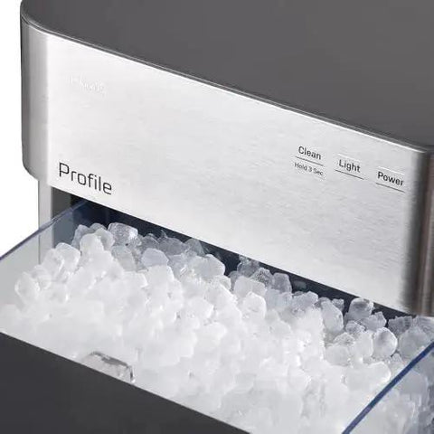 Close-up of GE Profile Opal 2.0 Nugget Ice Maker With Side Tank Pellet Ice WiFi 38 Lb 24 Hr dispensing ice cubes