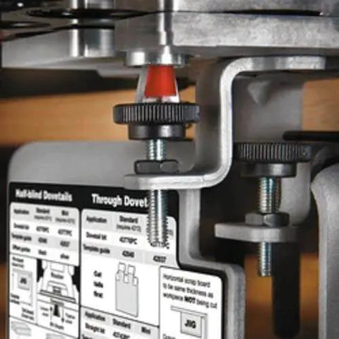 Close-up of a Dovetail Jig Kit For Woodworking With Mini Templates 4211 4213 And 4215, showing template alignment and router bit.