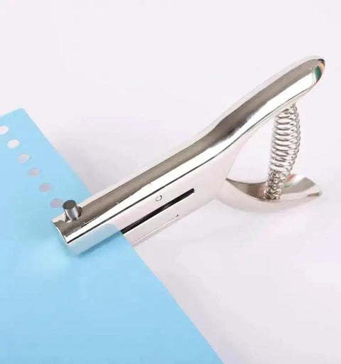 Heavy Duty Handheld Single Hole Punch For Crafts And Scrapbooking, Go-To 3/8 Inch (10mm) Zinc Alloy Punch in use on blue paper