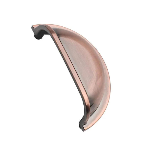 Side view of 3 Inch Bin Cup Drawer Cabinet Pulls In Antique Copper Finish, showing curved design and smooth finish.