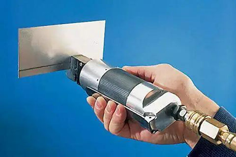 Handy Pneumatic Flanger Punch Tool in use on sheet metal showing Seven Thirty Second Inch Punch and 0.040 Inch Offset Flanges