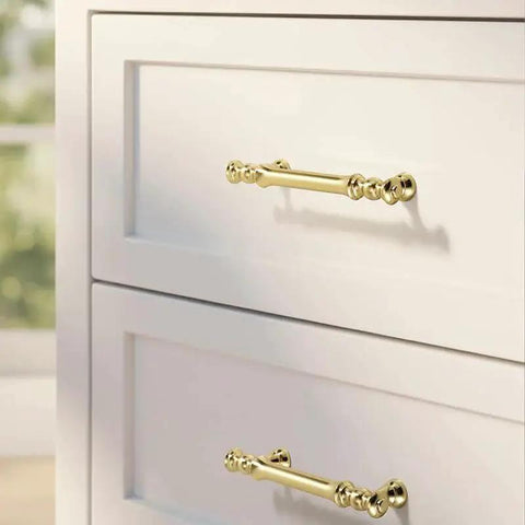 Minimalist Bright Gold Aluminum Alloy Cabinet And Wardrobe Handles Set Six Pack installed on white drawers