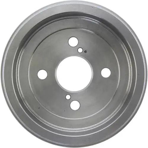 Front view of a metal rear brake drum with central bore and multiple mounting holes