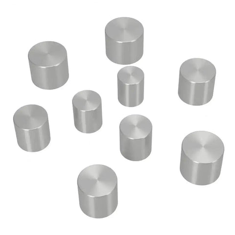 Coin Jewelry Making DIY Self Centering Hole Punch Kit with nine metal push rods for crafting perfect coin ring blanks.
