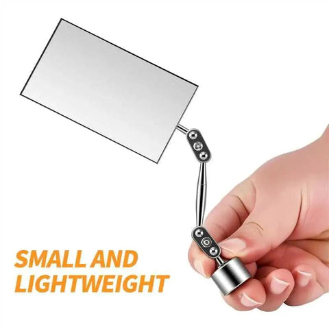 Hand holding Magnetic Base Inspection Mirror With 3.5x2 Inch Head, Swivel Ball Joint for tight spots in equipment.