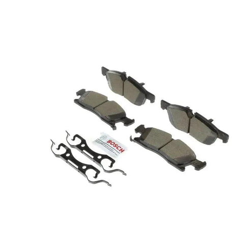 Bosch BC1904 QuietCast front ceramic brake pad set with four pads and mounting hardware