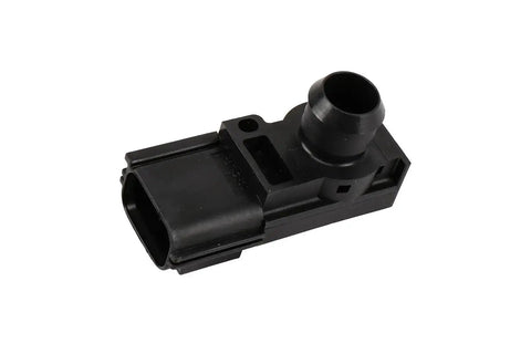 GM Genuine Parts power brake booster vacuum sensor, black plastic body, angled side view