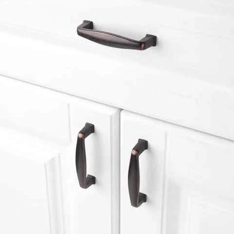 10 Pack Three And A Half Inch Oil Rubbed Bronze Cabinet Pulls With Three Inch Center To Center Mounting Holes Installed on White Cabinets