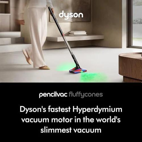 Dyson PencilVac Fluffycones cordless vacuum cleaner in a living room, slim design with a green floor light.