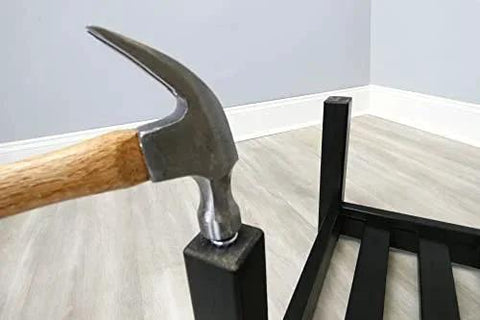 Hammer attaching 2 Inch Twin Wheel Office Chair Caster With Friction Stem Mount onto furniture leg