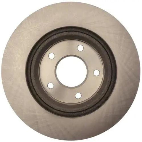 Raybestos R-Line front disc brake rotor; silver metal with central bore and four lug holes