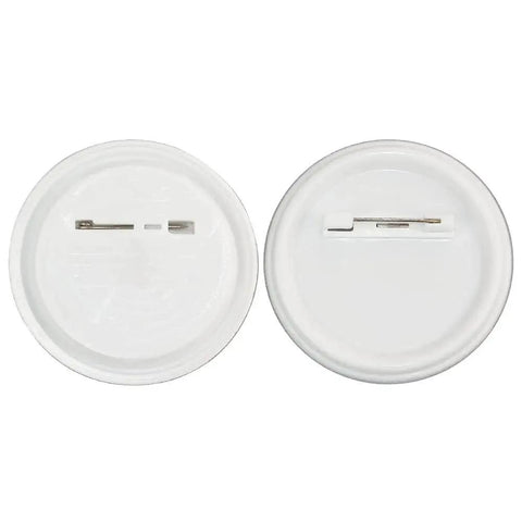 Back view: two white 58mm pin-back button backs with metal pin clasps.